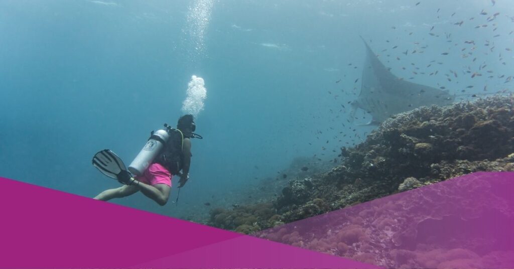 A man is doing a diving in Indonesia