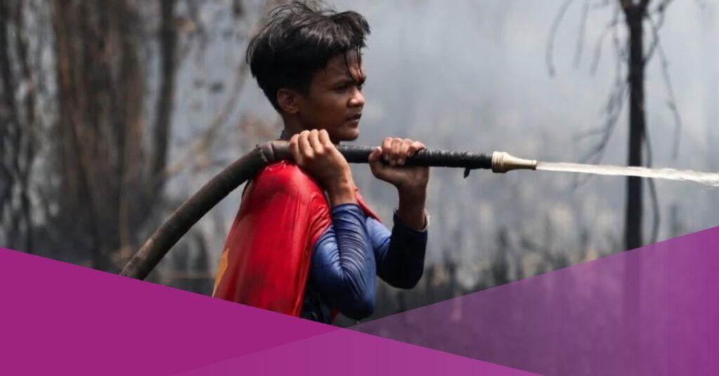 Teen in Superman Costume Helps Fight Forest Fires in Indonesia